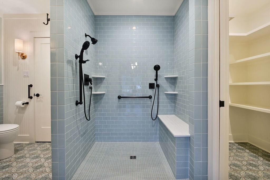 Professional grab bar installation in a tiled bathroom